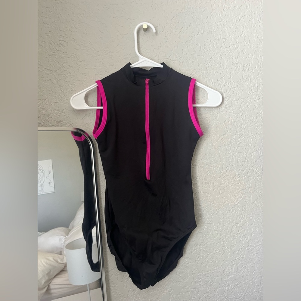 Black leotard with hot pink lining